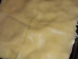 Lasagna de carne, jamón y queso