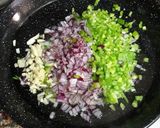 Foto del paso 10 de la receta Arroz bomba caldoso de pulpitos y tiras de piquillo