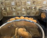 A picture of step 22 of Dal Bafla Baati Churma.