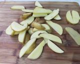 A picture of step 1 of Crispy potato wedges with spicy mango sauce.