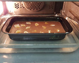 Foto del paso 7 de la receta: Budin de pan dulce, chocolate almendra y mandarina