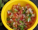 A picture of step 2 of Chana jor garam nachos.