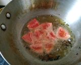 A picture of step 3 of Bhindi tomato masala fry.