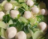 A picture of step 2 of Just in 15 mins! Chinese style fish ball, bok choy and egg soup.