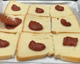 صورة لخطوة 3 من وصفة 🍕 بيتزا التوست السريعة 😋