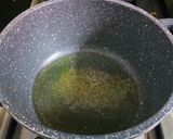 A picture of step 2 of Instant Lauki Masala.