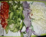 A picture of step 5 of Jollof rice and stir fry veggies with chicken #hubyfavouritedish.