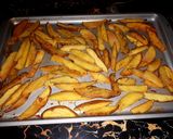 A picture of step 4 of Baked rosemary potatoe wedges.