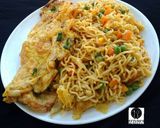 A picture of step 11 of Jollof Vegetable noodles with fried eggs.