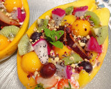 Foto del paso 9 de la receta: Papaya rellena tropical 🏝️🥭🥝🍇🍓🥥
