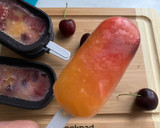 Foto del paso 5 de la receta: Polo de zumo de naranja y cerezas 🍒