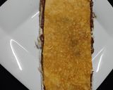 A picture of step 3 of Chocolate Meetha Anda Bread Roll 😋.
