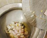A picture of step 1 of Onion pulao Sindhi Special Bhughal Rice.