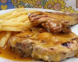 Foto del paso 8 de la receta: Costillitas de cerdo con salsa de miel y naranja