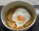 Jah Jan Mien (instant packet noodles) with peanut butter, spring onions topped with fried egg recipe step 7 photo