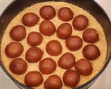 A picture of step 5 of Gulab Jamun Cheesecake with Arrowroot Biscuit Crust.