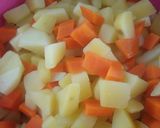 Foto del paso 2 de la receta: Filete de Bacalao con papas, zanahorias y coco