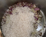 A picture of step 2 of Spinach and rice in lemon 🍋 😃.