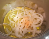 Foto del paso 3 de la receta: Calamares salteados al pesto sobre cama de patatas