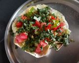 A picture of step 3 of Masala papad or salad on papad.