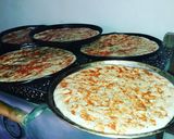 Foto del paso 4 de la receta: Pre pizzas para vender