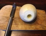 A picture of step 1 of California Farm Stuffed Baked Onions.
