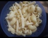 A picture of step 1 of Green and pink sauce backed pasta.