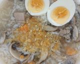 A picture of step 6 of Rice Porridge with Button Mushrooms.