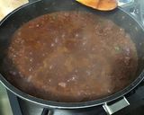 Une image de l'étape 16 de Dahl de lentilles jaunes aux carottes violettes, tomates et courgette.