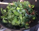 Une image de l'étape 7 de Porc sauté à l asiatique aux pousses de bambou et poireaux.