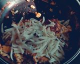 A picture of step 5 of Swiss Breakfast Egg and Red Chili.