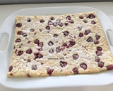 A picture of step 3 of White Chocolate Raspberry Squares.