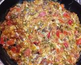 A picture of step 5 of Shakshuka with Eggs and Cheese.