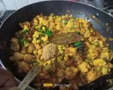 A picture of step 10 of Aloo Gobhi Matar Curry.