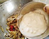 A picture of step 4 of Masaledar dahi (curd) bhindi.