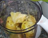 A picture of step 1 of Pineapple & coconut drink.