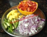 A picture of step 1 of Aaloo tomato gravy in rich coconut milk.