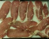 A picture of step 4 of Tender seasoned pork loin cuts.