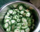 A picture of step 1 of Karela potato ki sabji.