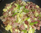 A picture of step 6 of Rice with Smoked Pork Loin, Egg, and Corn.