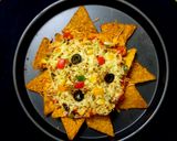 A picture of step 8 of Cheesy loaded vegetable Nachos.