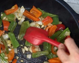 Foto del paso 4 de la receta: Arroz caldoso de pollo con verduras