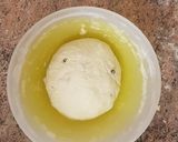 Foto del paso 2 de la receta Panecillos de yogurt con pasas y pepitas de chocolate