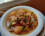 Foto del paso 4 de la receta: Estofado de pulpo con pepitona y pollo