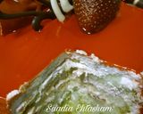 A picture of step 6 of Pineapple cake with orange mirror glaze.