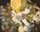 A picture of step 6 of One Whole Chicken in a Soup over Noodles.