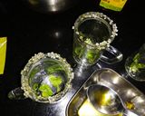 A picture of step 4 of Honey and mint iced green tea shots.