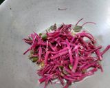 A picture of step 1 of Red Amaranth Dry Curry.