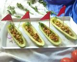 A picture of step 4 of Sprouts chat in cucumber boat.