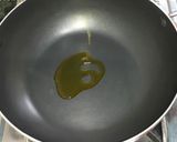 A picture of step 3 of Bhatki macher paturi.